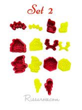 Load image into Gallery viewer, mini christmas cookie cutter advent calendar- santa, gingerbread house, gift, wreath, snowman and more