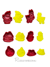 Load image into Gallery viewer, mini christmas cookie cutter advent calendar- santa, gingerbread house, gift, wreath, snowman and more